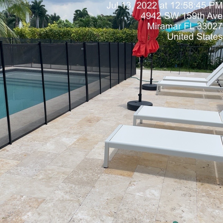 Finished pool deck and safety fence